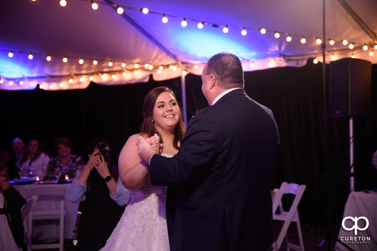 Bride dancing with her father at the Duncan Estate wedding reception.