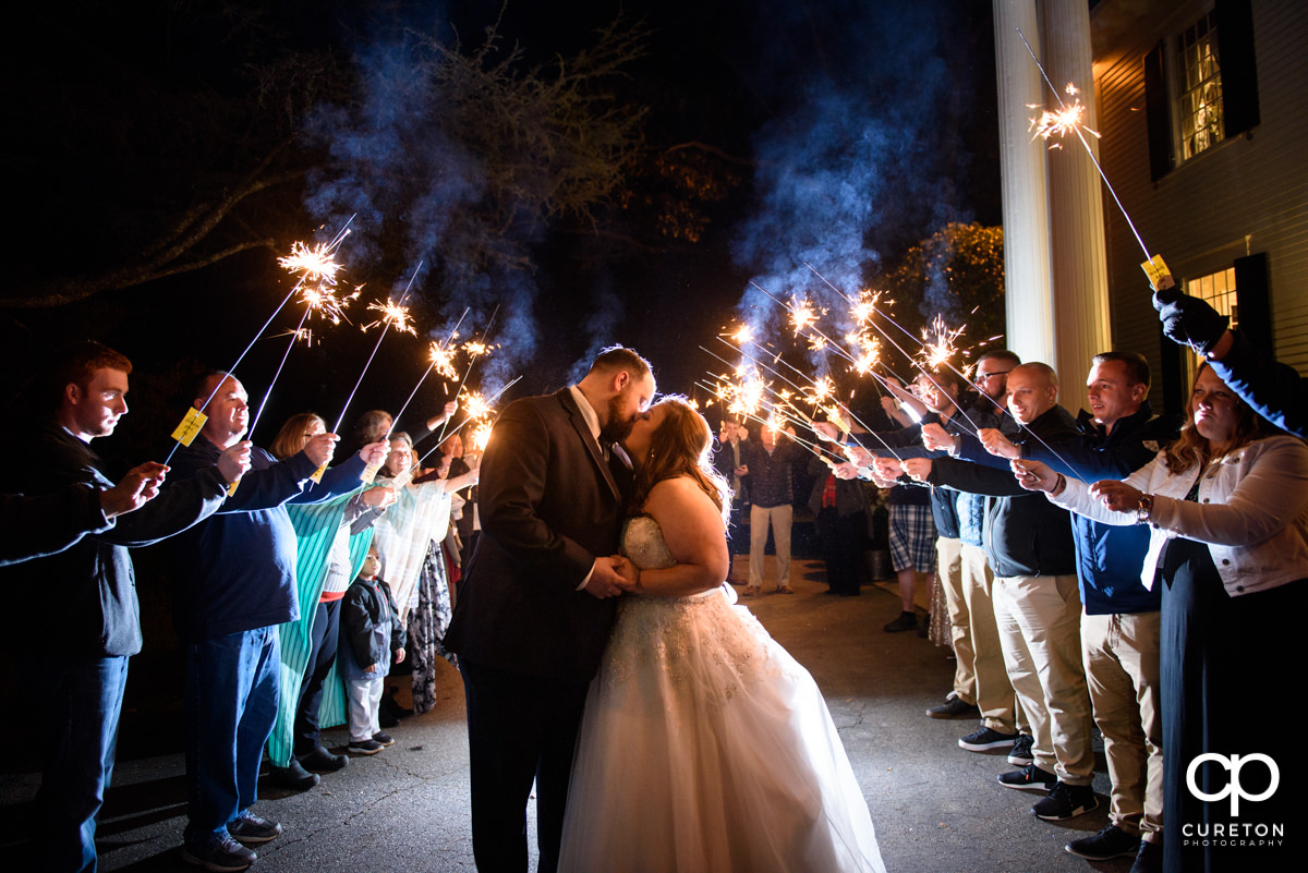 Bride and groom making an epic sparkler grand exit from the Duncan Estate wedding in Spartanburg,SC.