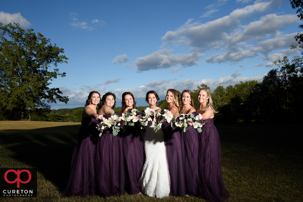Bridesmaids laughing.