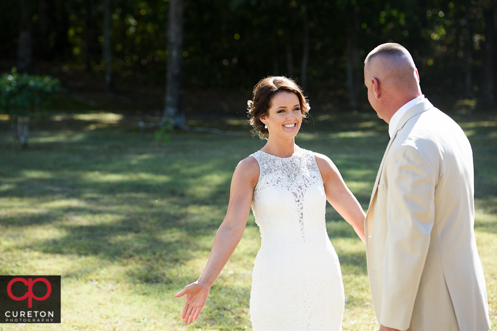 Bride and father first look.