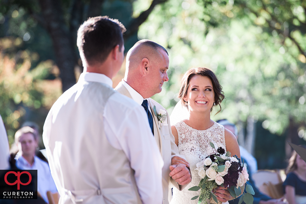 Bride looking at her father.