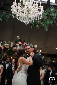 Bride dancing with her stepdad.