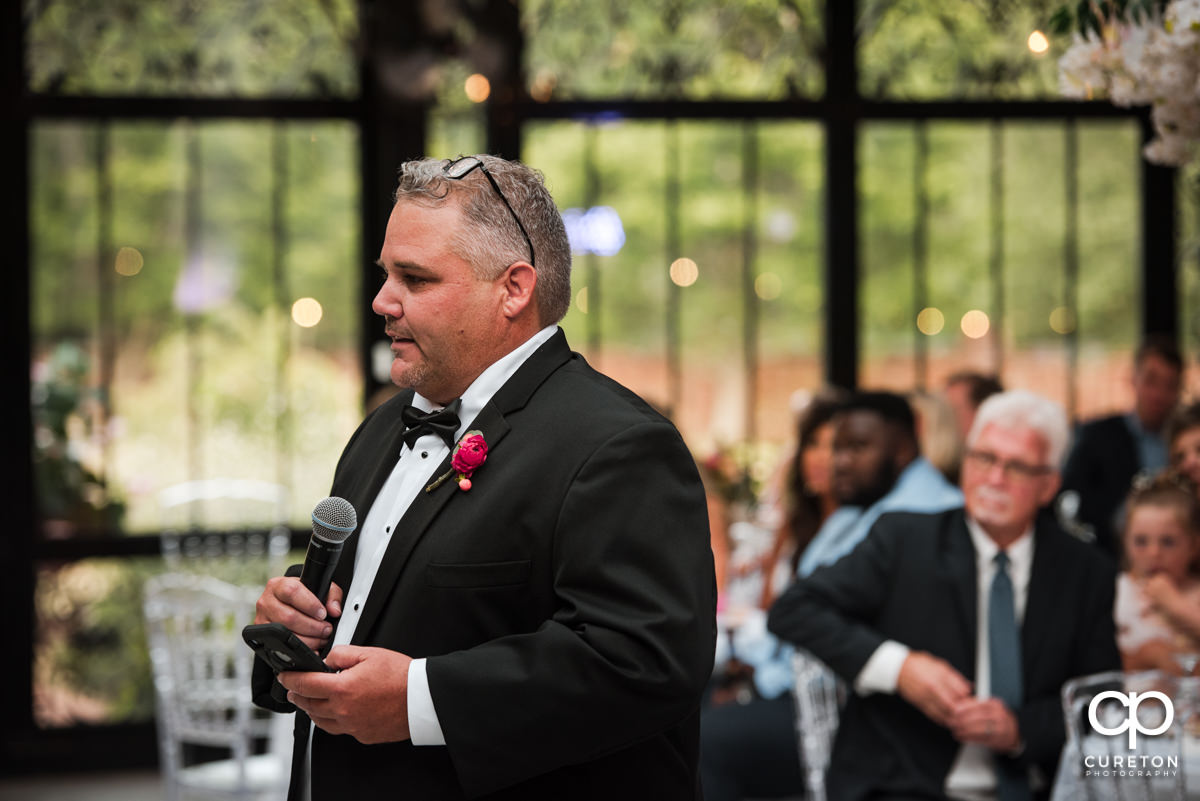 Groom's father making a speech.