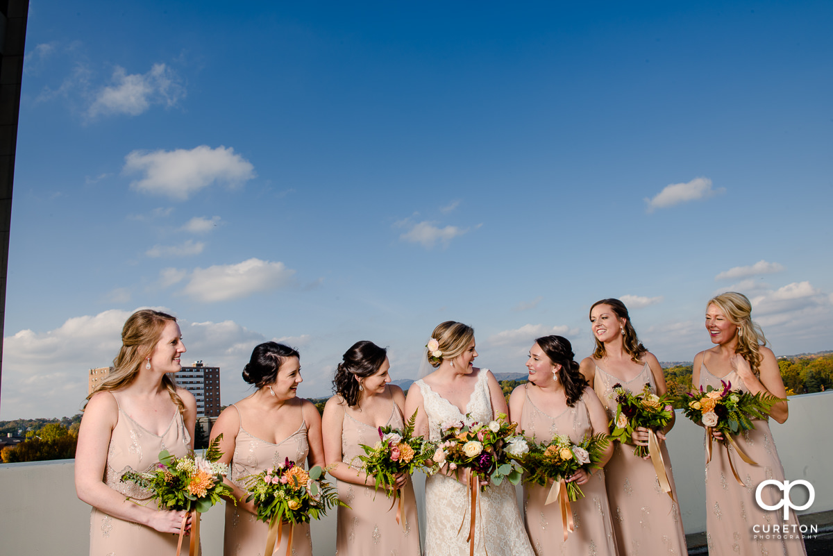 Bridesmaids on a rooftop.