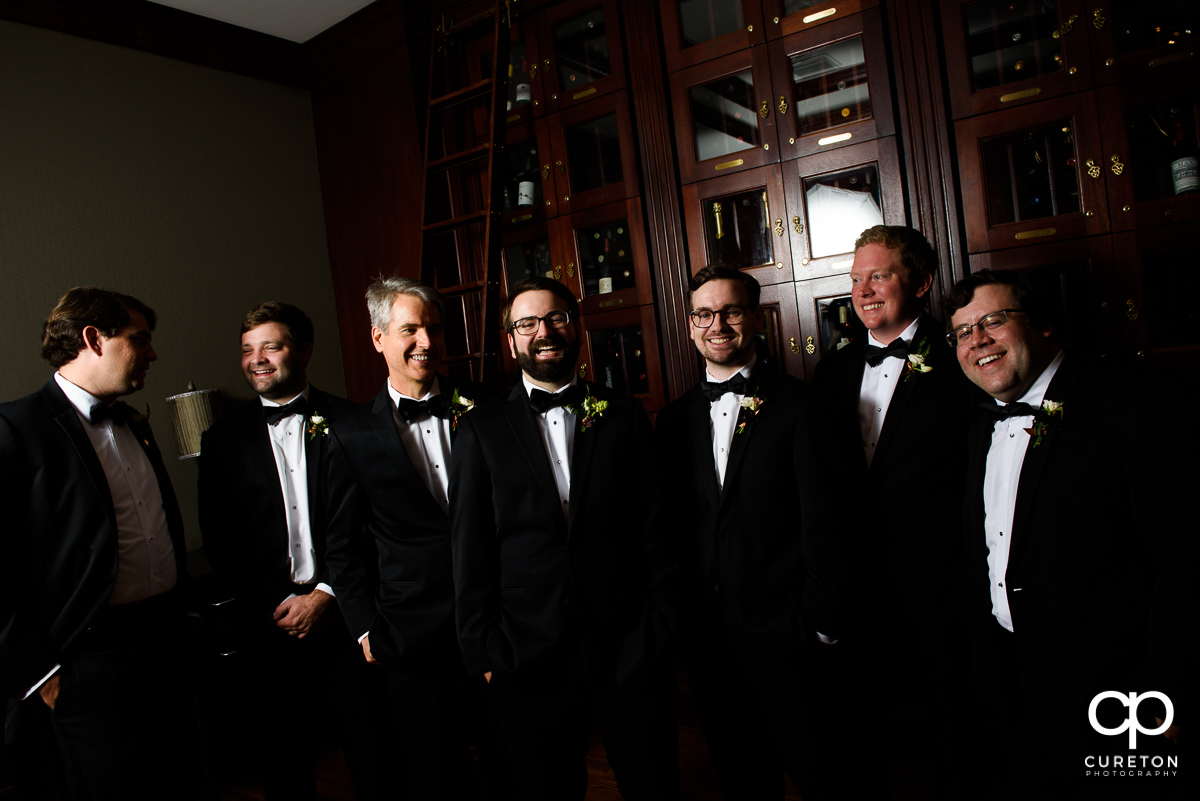 Groomsmen in the wine room at the Commerce Club.
