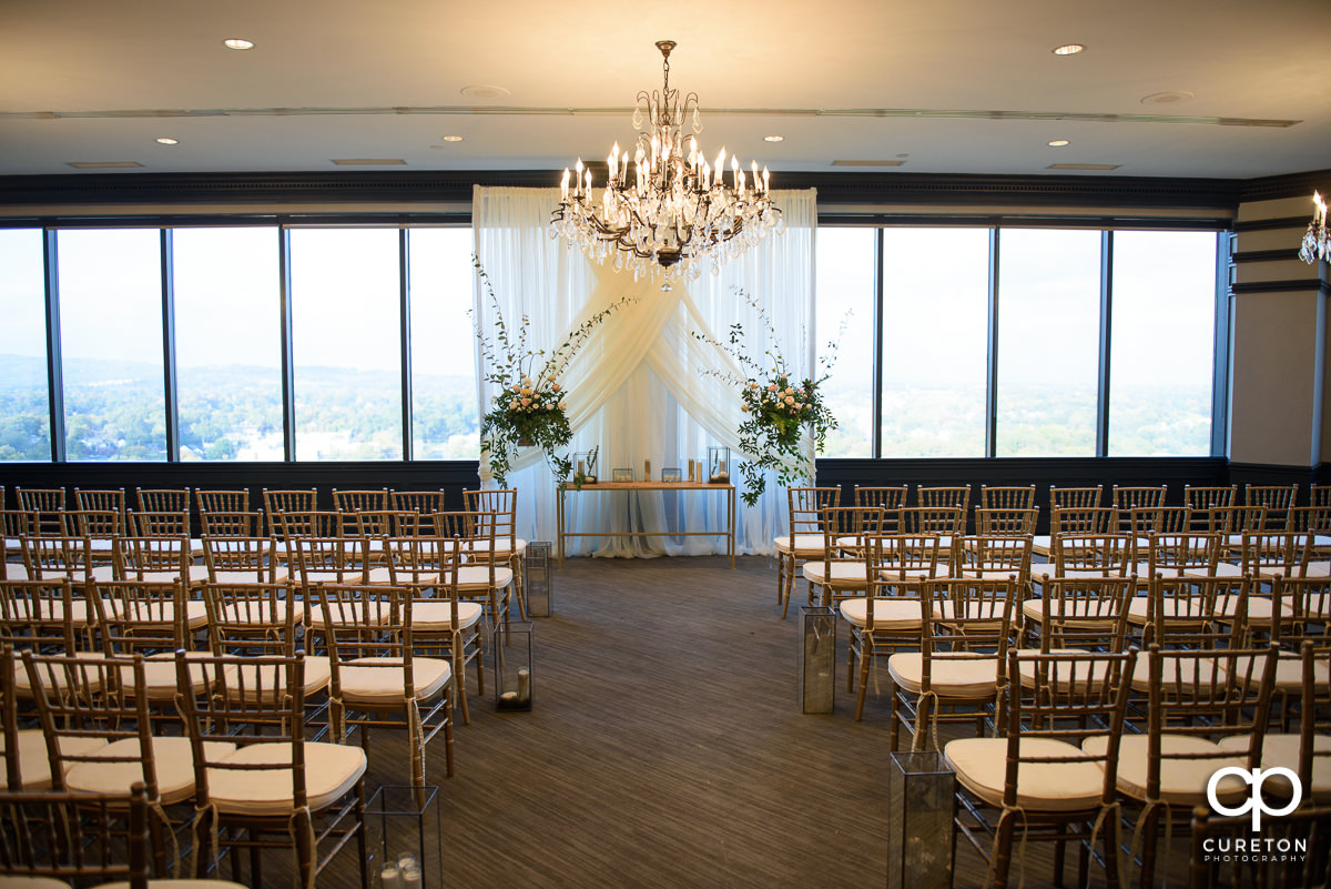 The Commerce Club setup for a wedding ceremony with Chivari chairs.