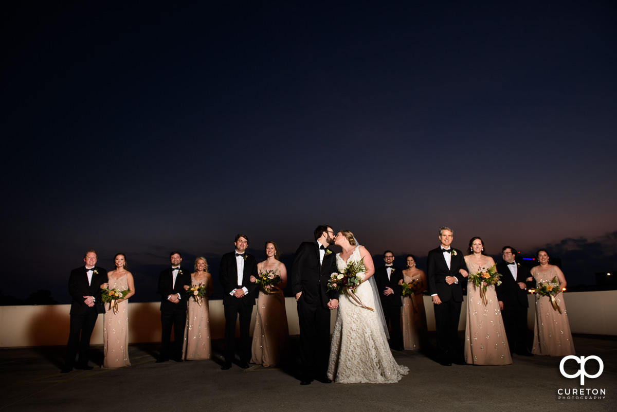 Bridesmaids and groomsmen on a rooftop in downtown Greenville,SC.