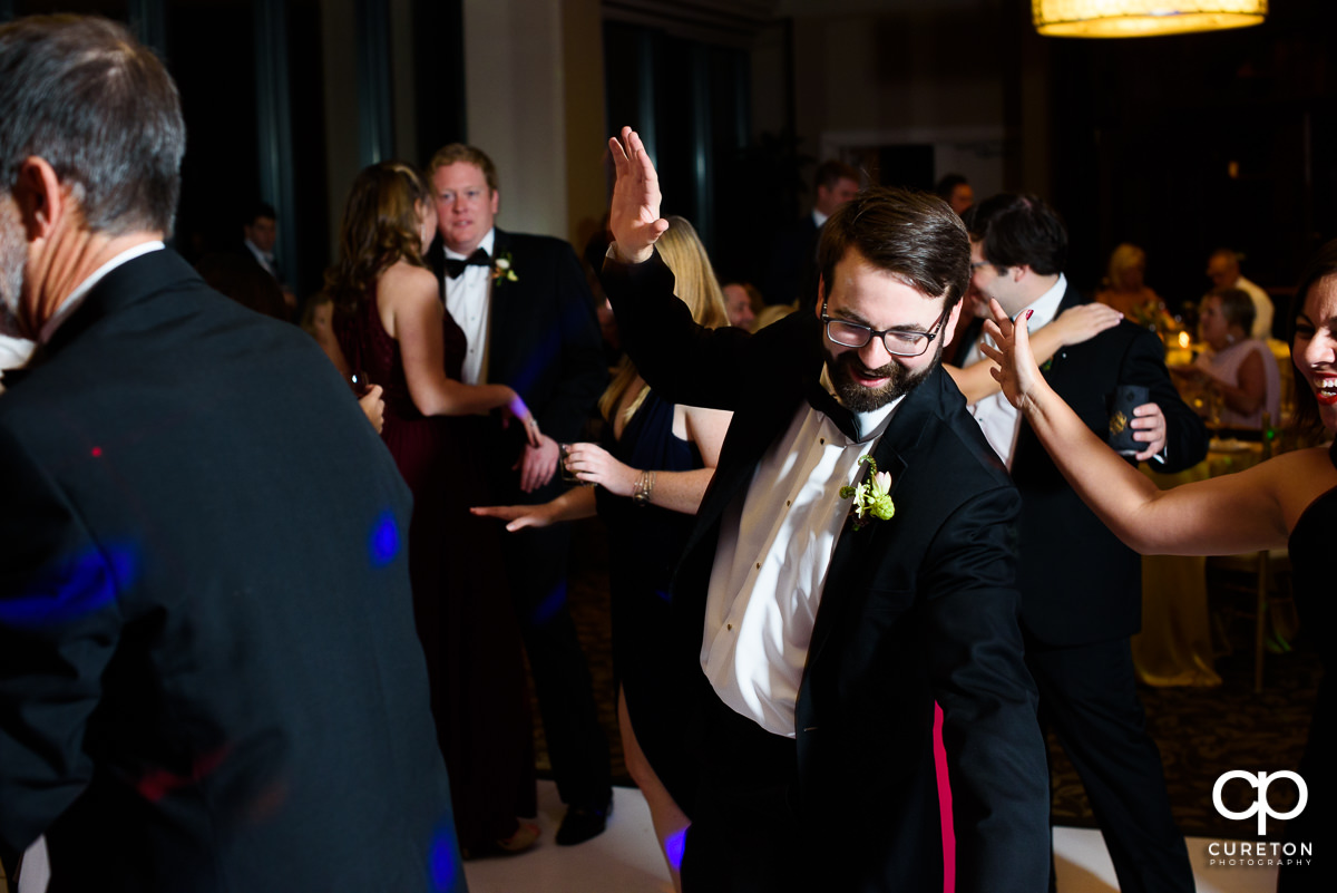 Wedding guests dancing on the dance floor at The Commerce Club.