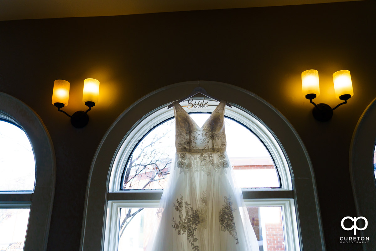 Bride's dress in beautiful window light.
