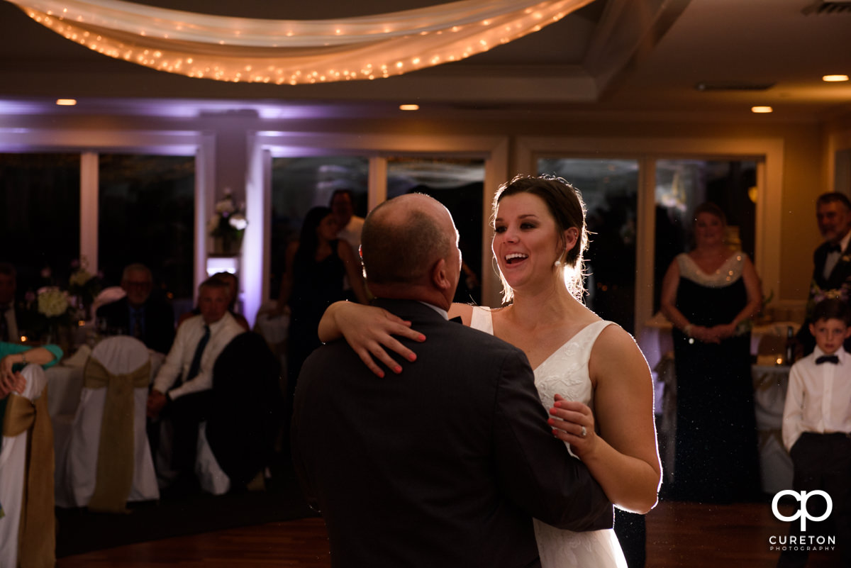 Bride dancing with her father at the wedding reception.