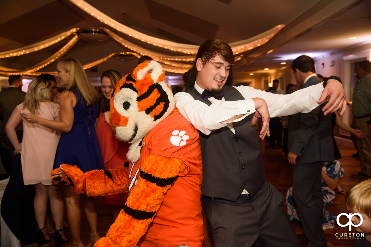 Clemson Tiger dancing at the wedding reception.