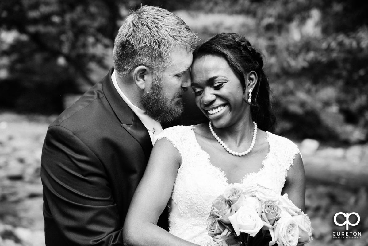 Bride smiling at her groom.