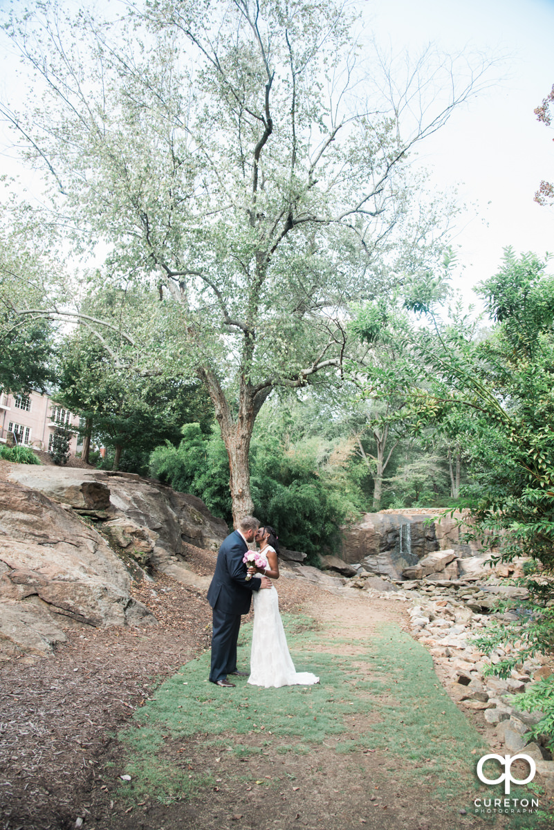 Bride and groom at the Rock Quarry Garden.