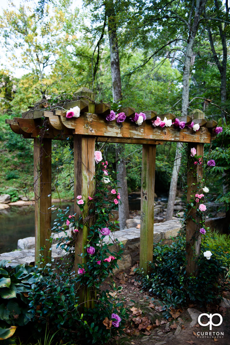 The floral arbor for their wedding at Falls Park.