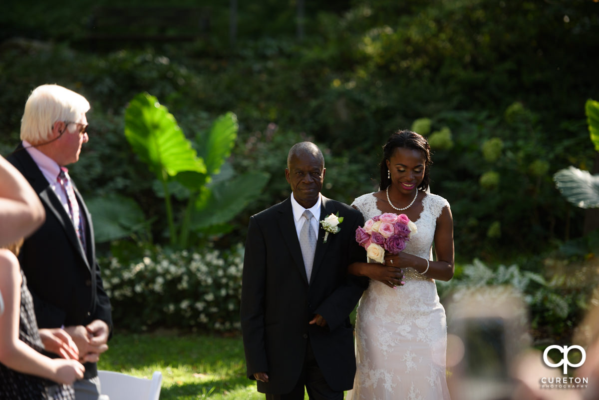 Bride making her way down the aisle.