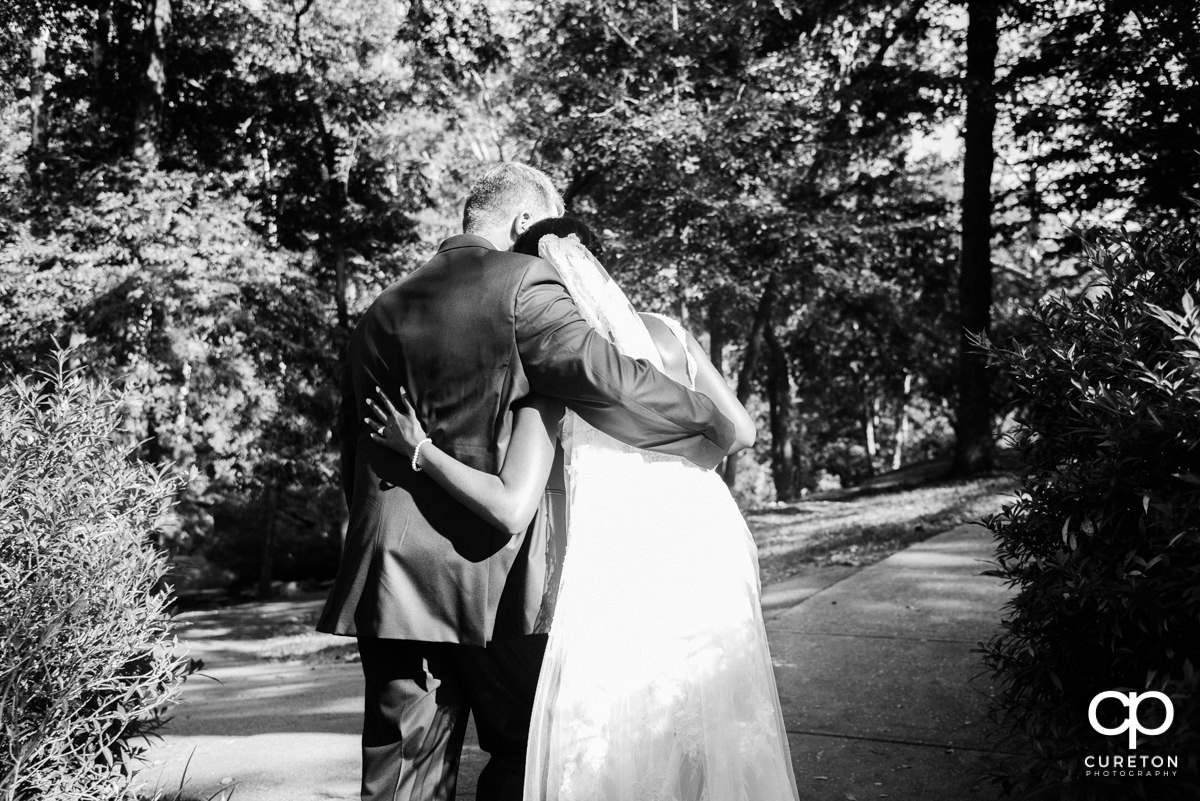 Bride and groom walking back down the aisle.