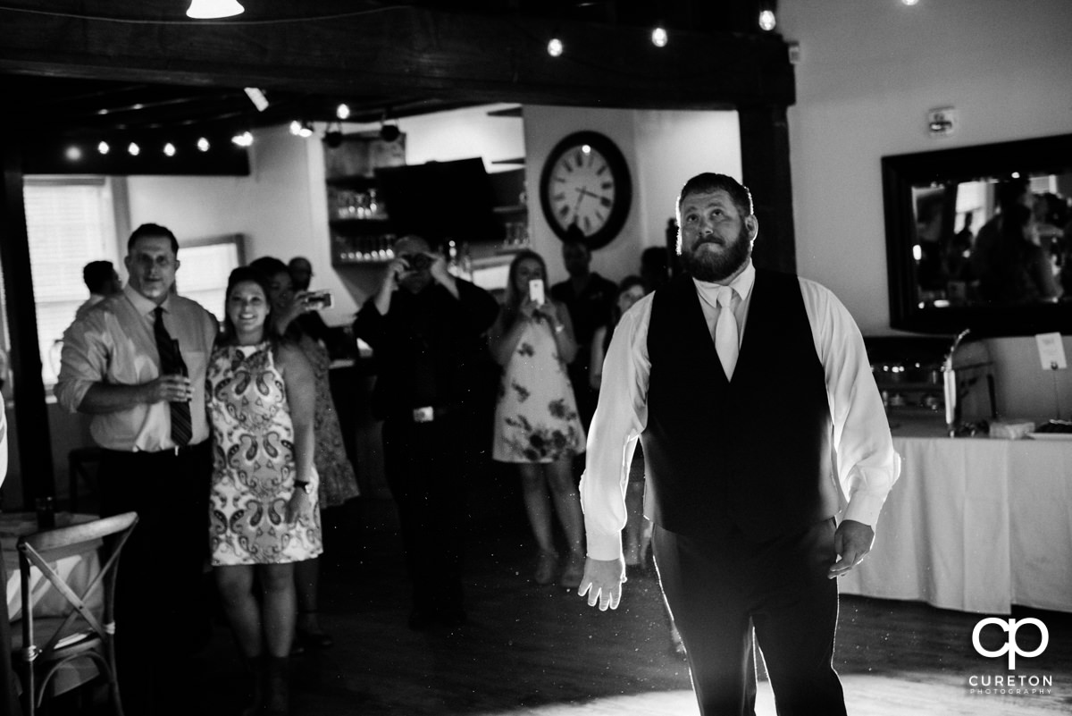 Groom dancing.