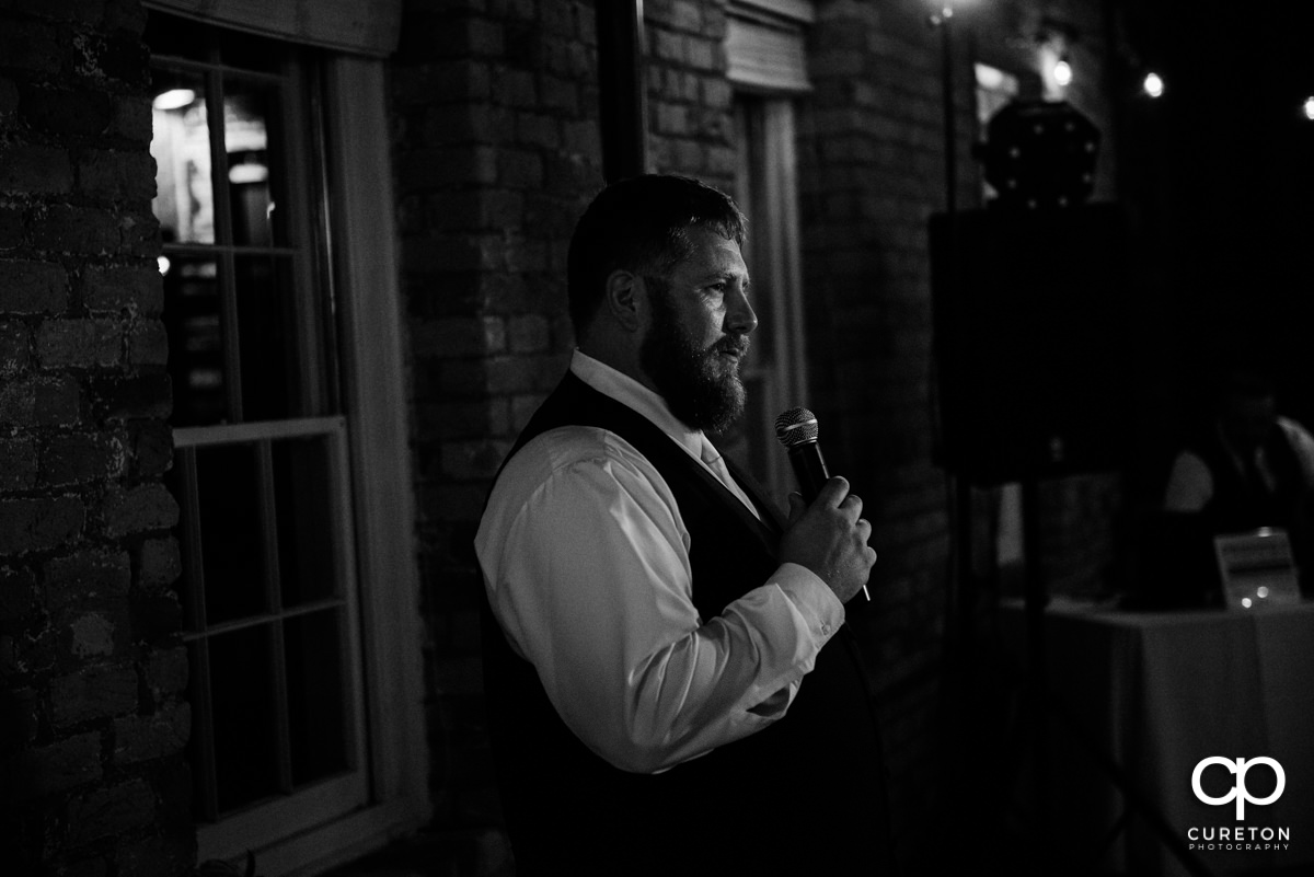 Groom welcoming the wedding guests.