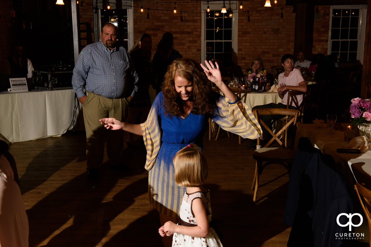 Wedding guests dancing as Ray from Pros Only DJ entertains the crowd.