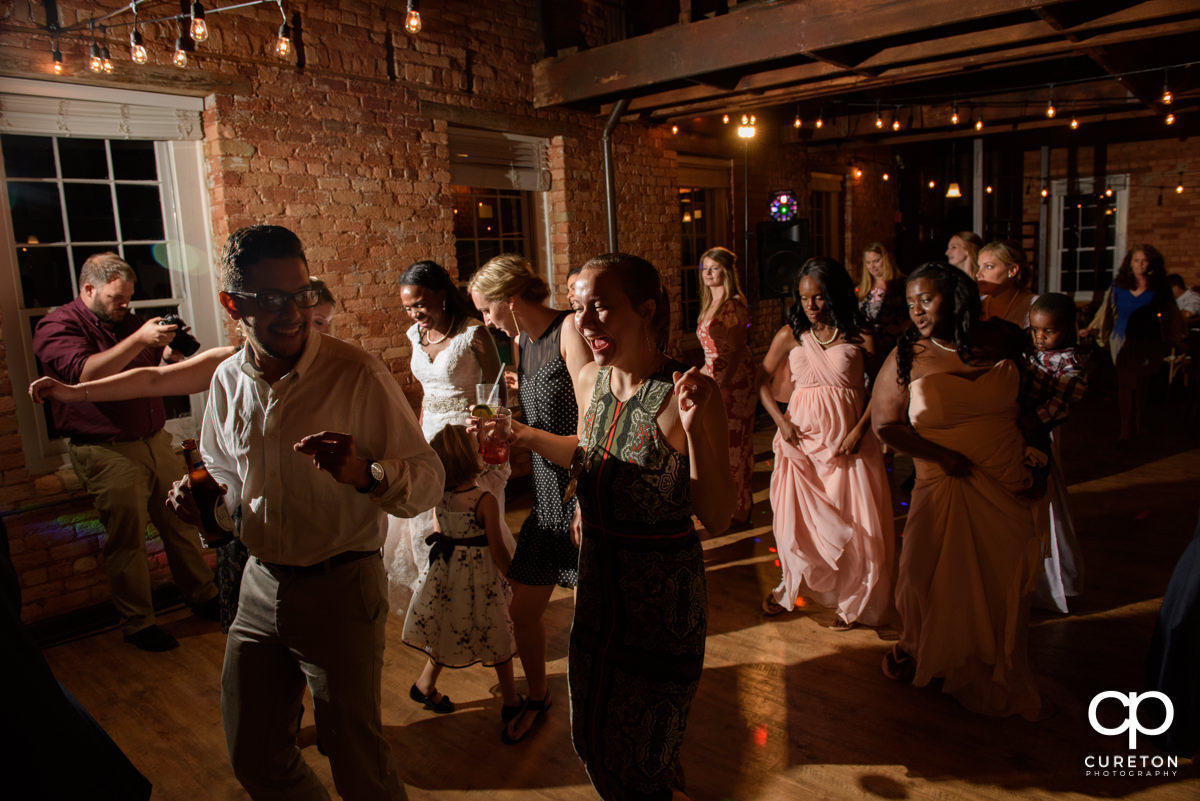 Wedding guests dancing as Ray from Pros Only DJ entertains the crowd.