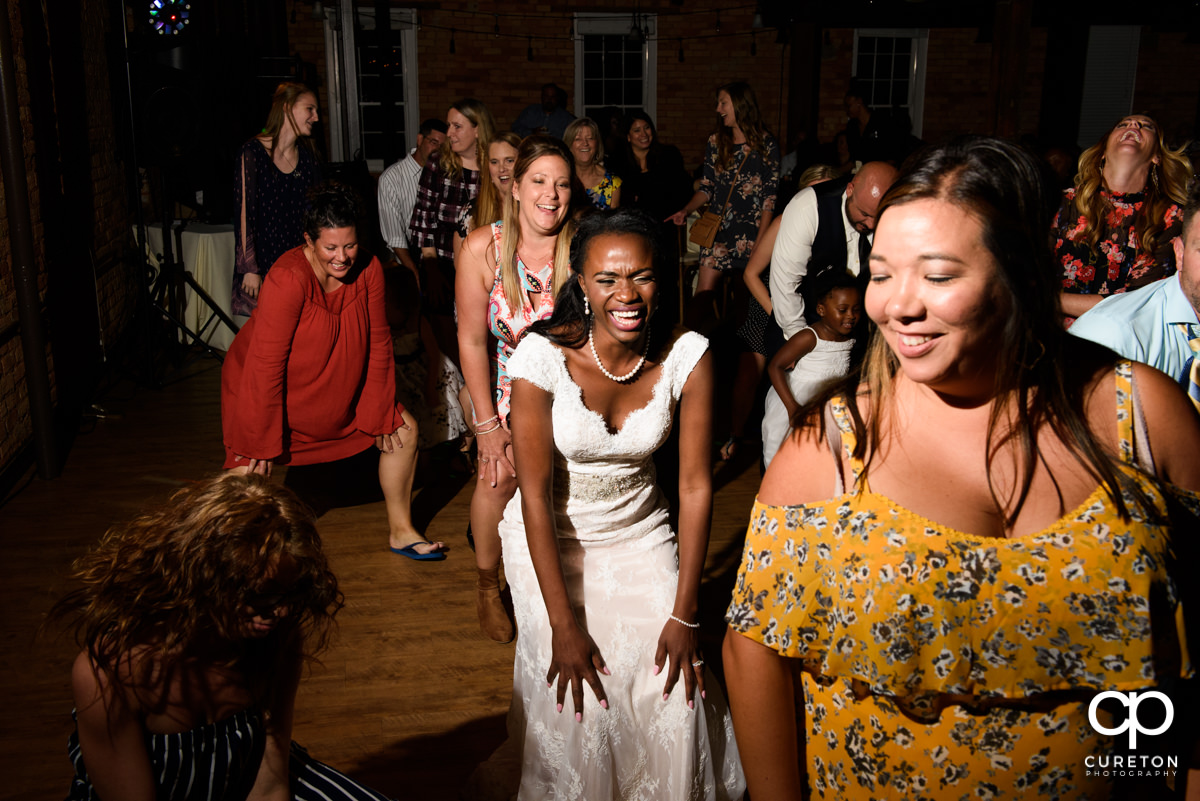 The bride doing the cha cha slide.