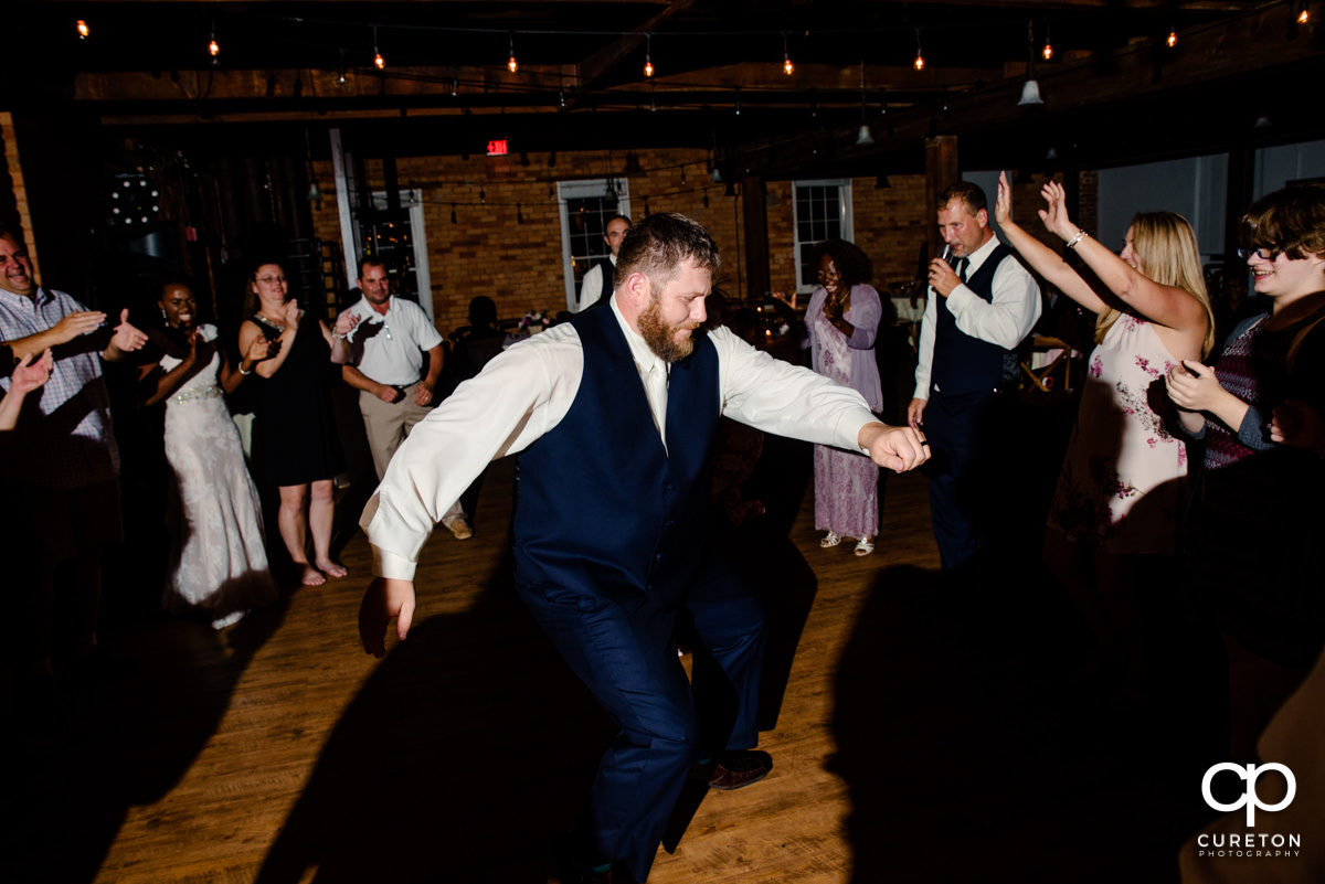 Groom dancing.