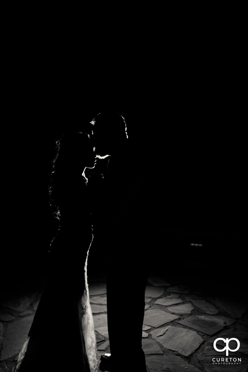 Silhouette of the bide and groom.