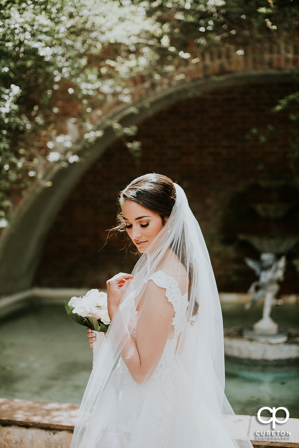 Stunning high fashion bridal at the rose garden on the Furman University campus.