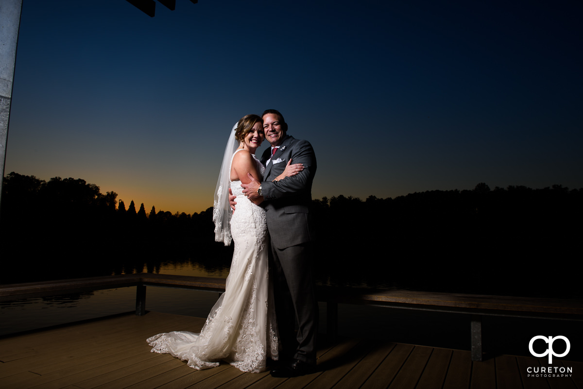 Bride and groom at sunset after their wedding at Furman wedding.
