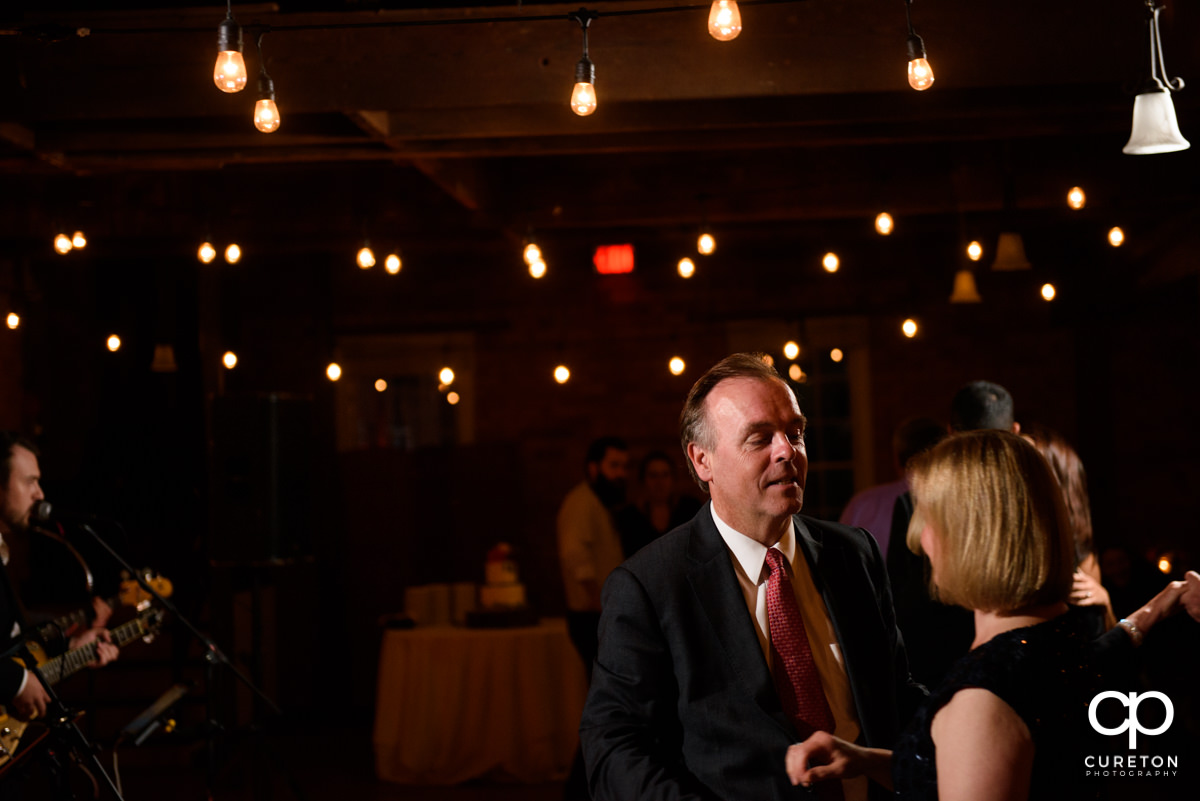 Wedding guests dancing to the sounds of the Emerald Empire Band.