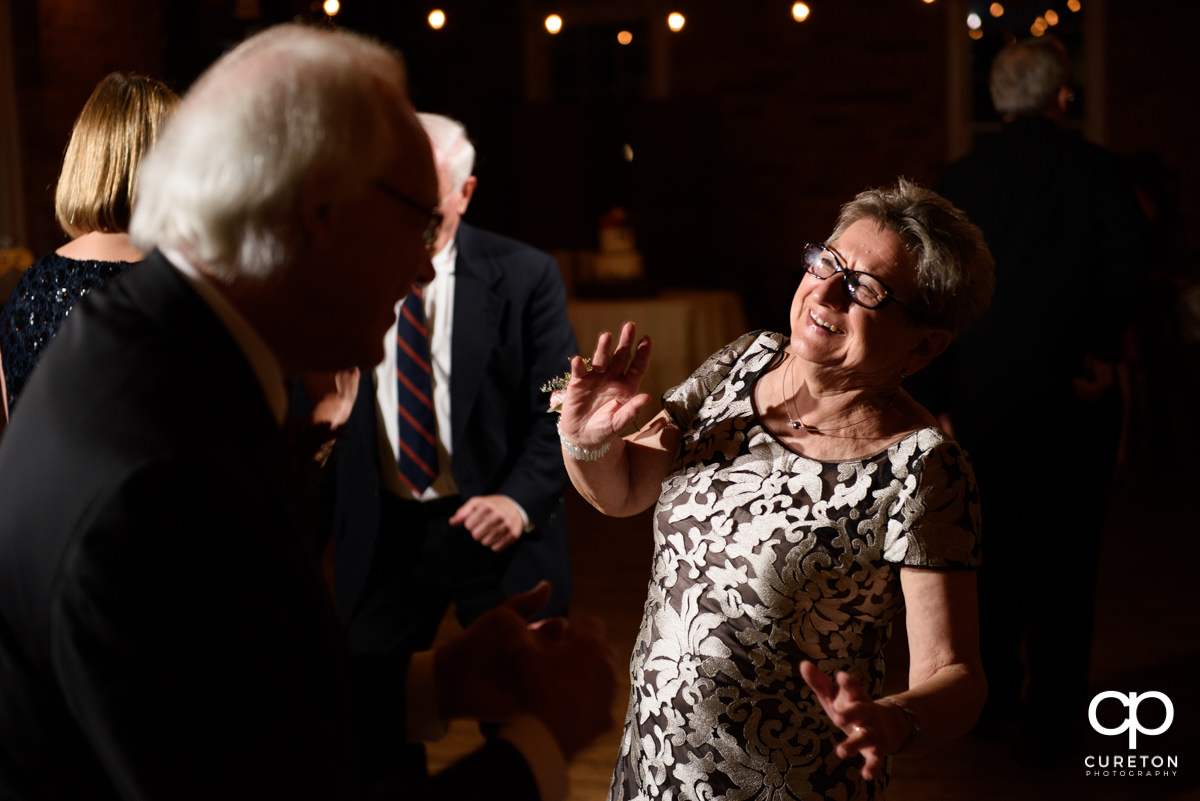 Wedding guests dancing to the sounds of the Emerald Empire Band.