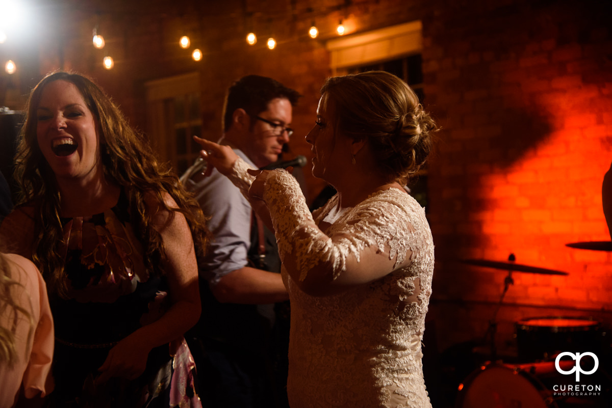 Wedding guests dancing to the sounds of the Emerald Empire Band.