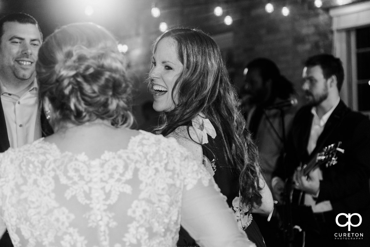 Wedding guests dancing to the sounds of the Emerald Empire Band.