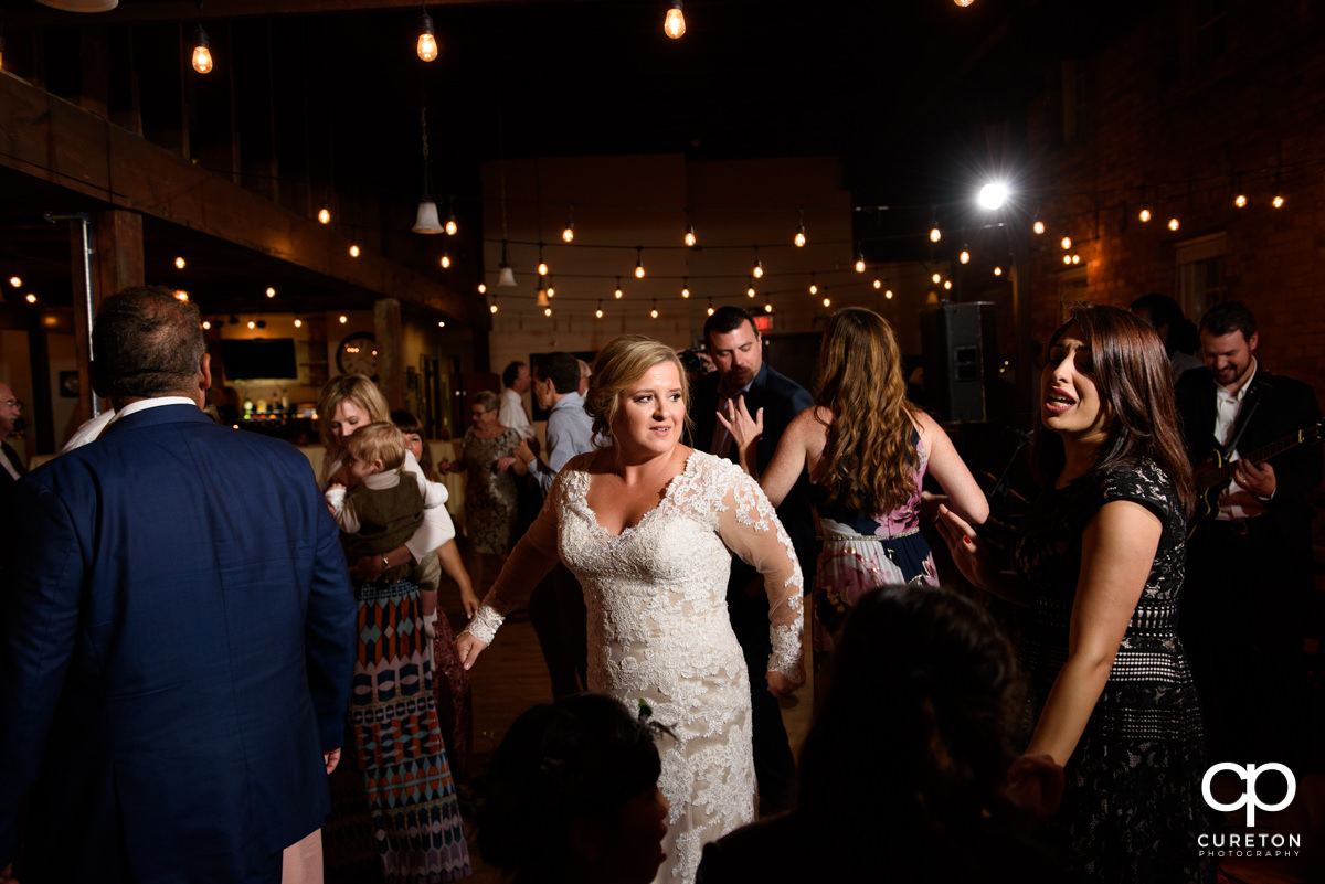 Wedding guests dancing to the sounds of the Emerald Empire Band.