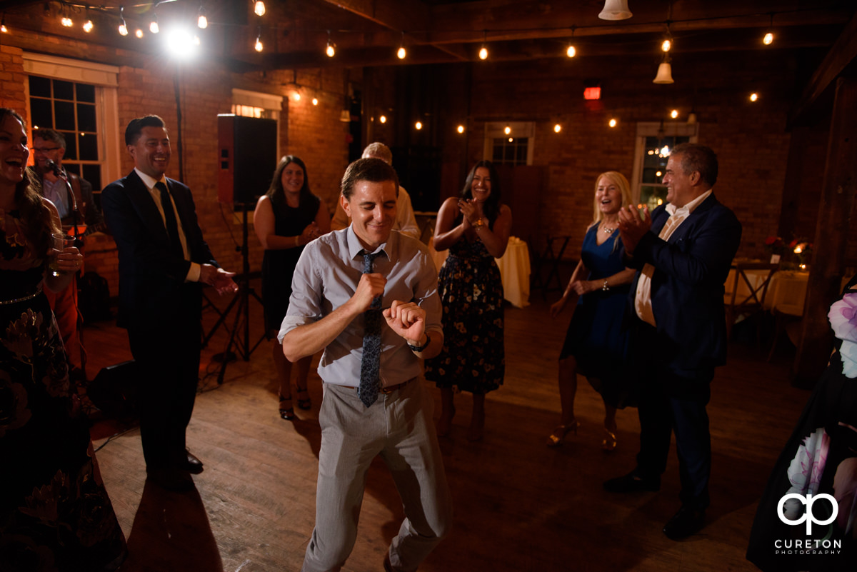 Wedding guests dancing to the sounds of the Emerald Empire Band.