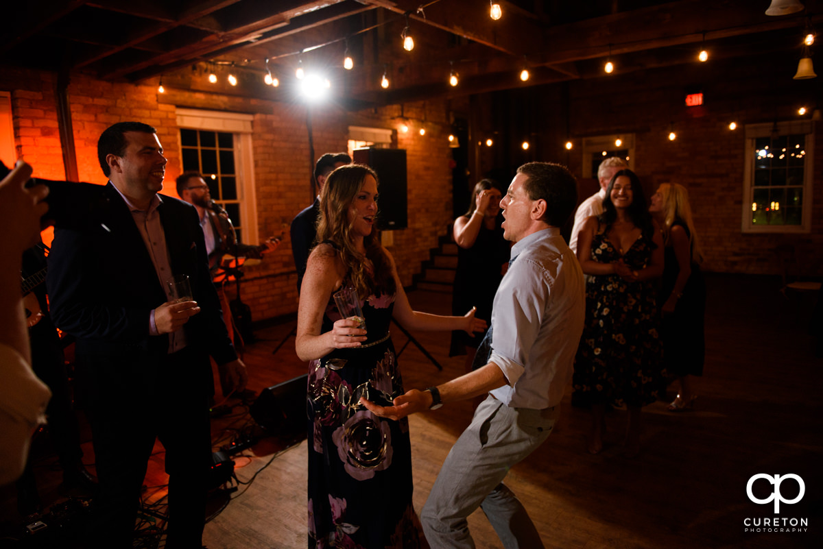 Wedding guests dancing to the sounds of the Emerald Empire Band.