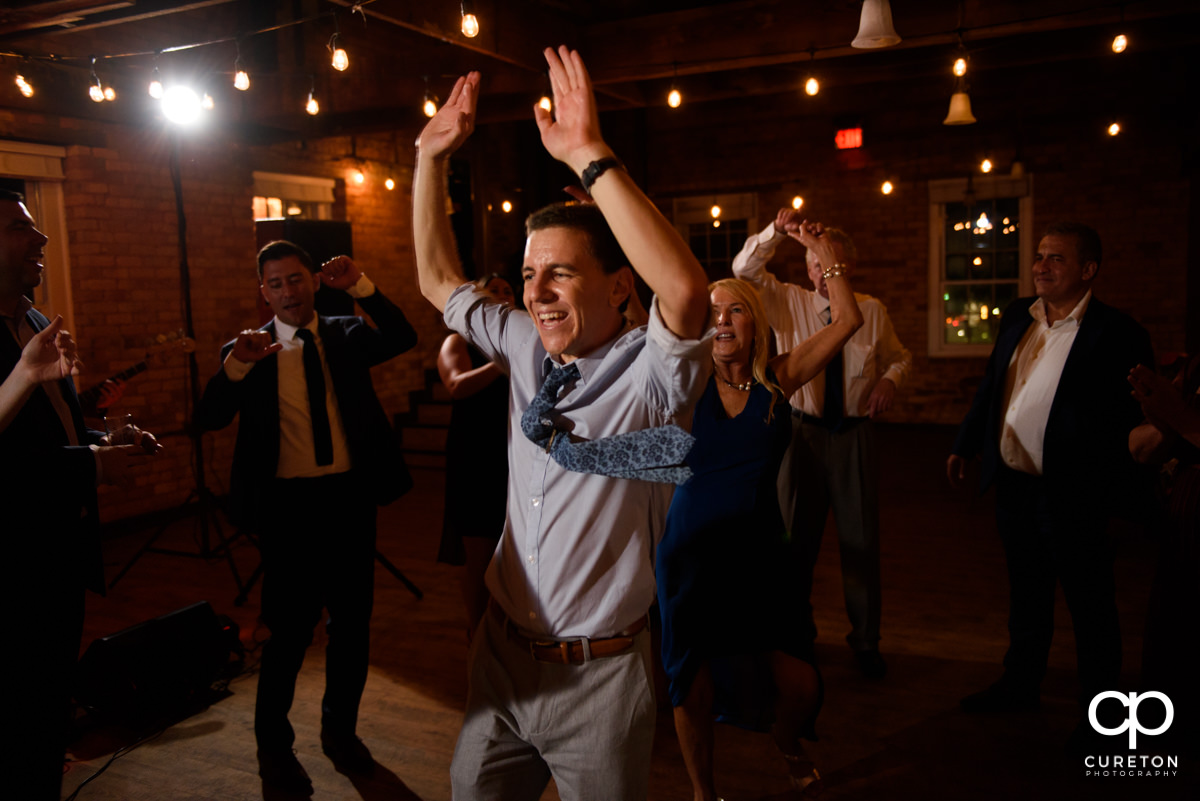 Wedding guests dancing to the sounds of the Emerald Empire Band.