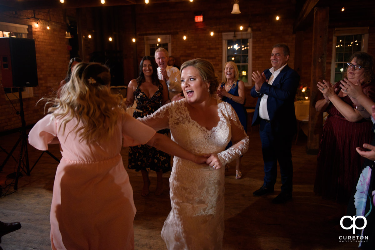 Wedding guests dancing to the sounds of the Emerald Empire Band.