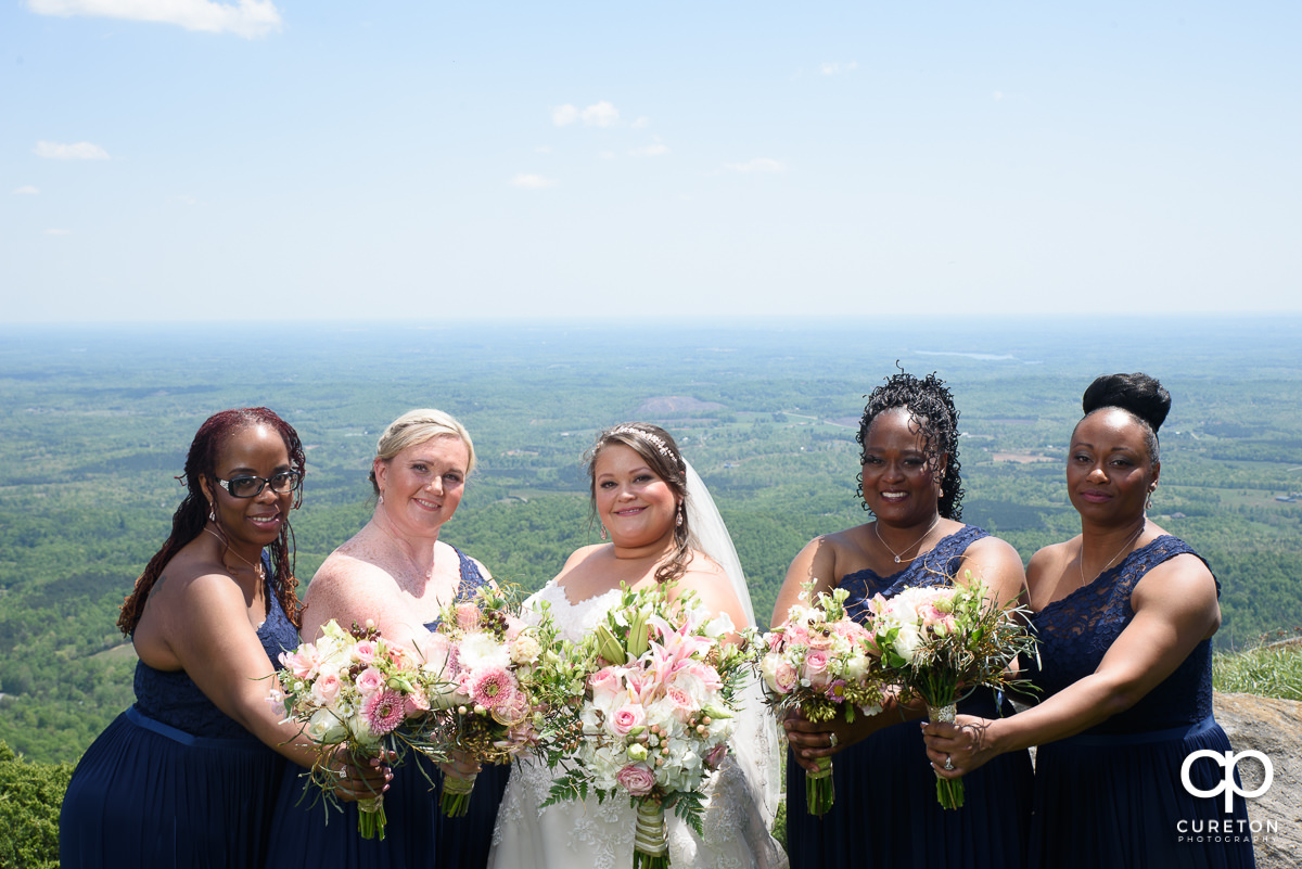 Bridesmaids on a mountain.