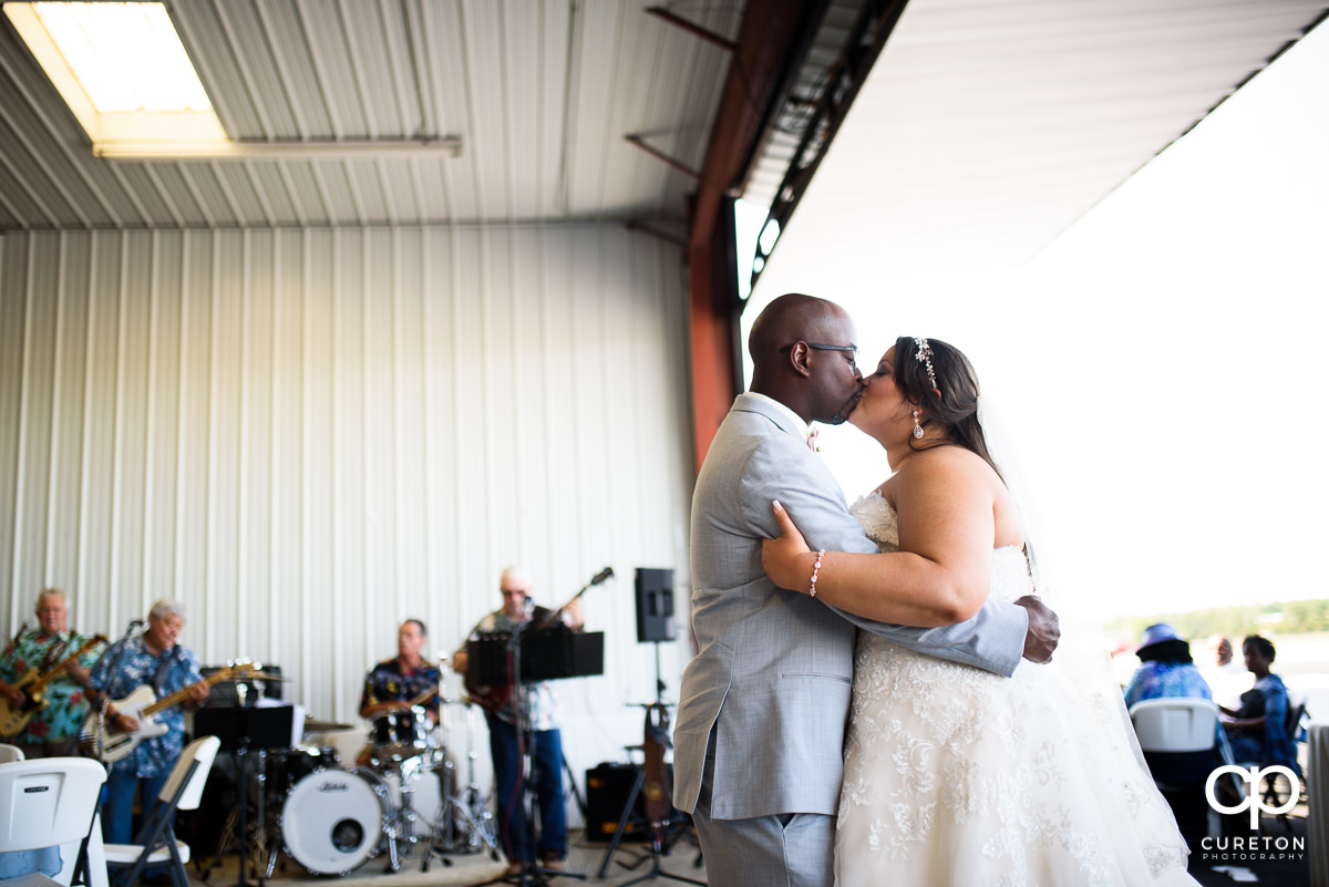 Bride and groom first dance at the Runway Cafe Hangar.