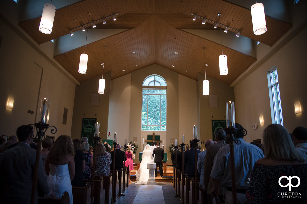 Bride and groom saying their vows.