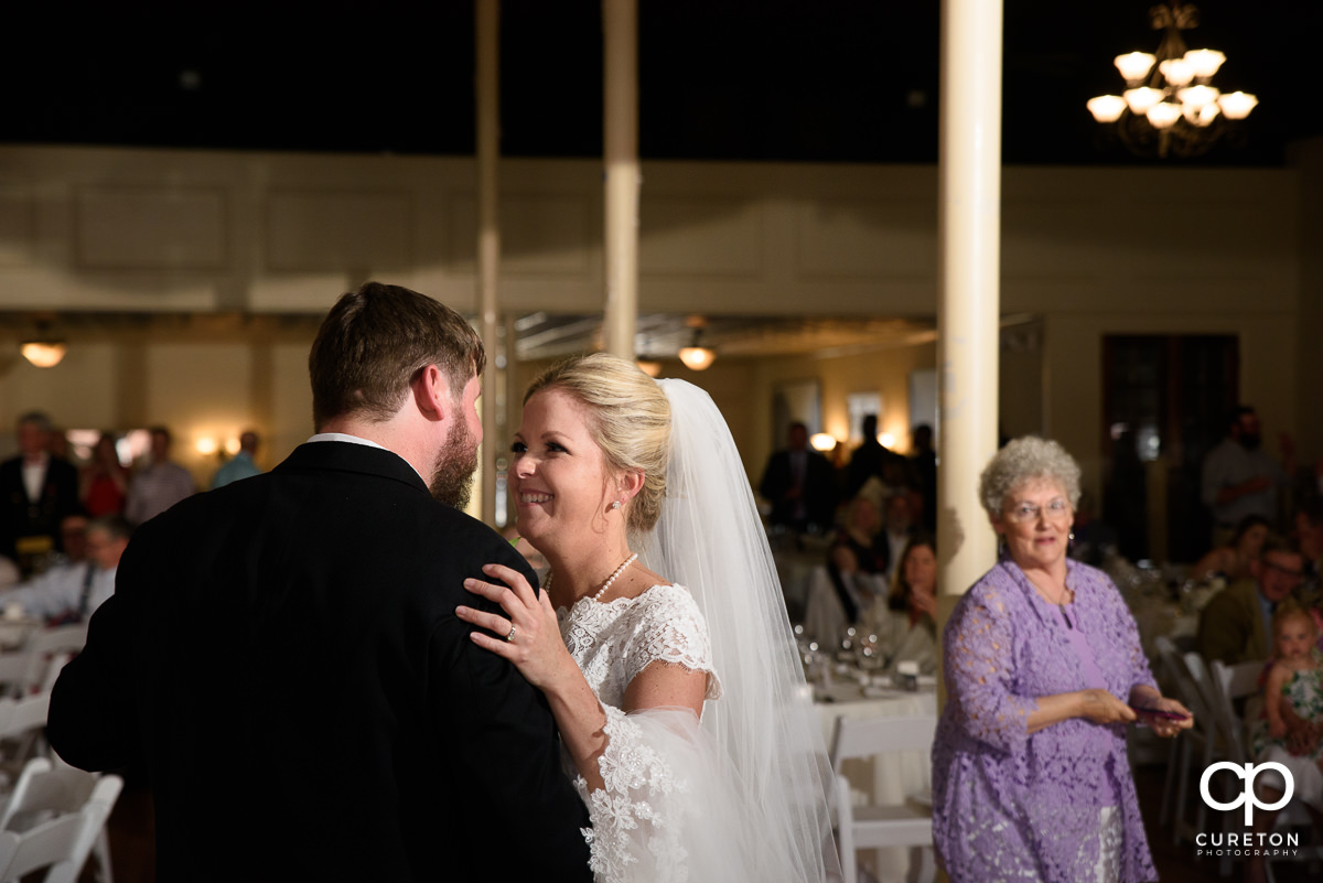 Bride and groom sharing a dance at their Grace Hall wedding reception in downtown Greer,SC.