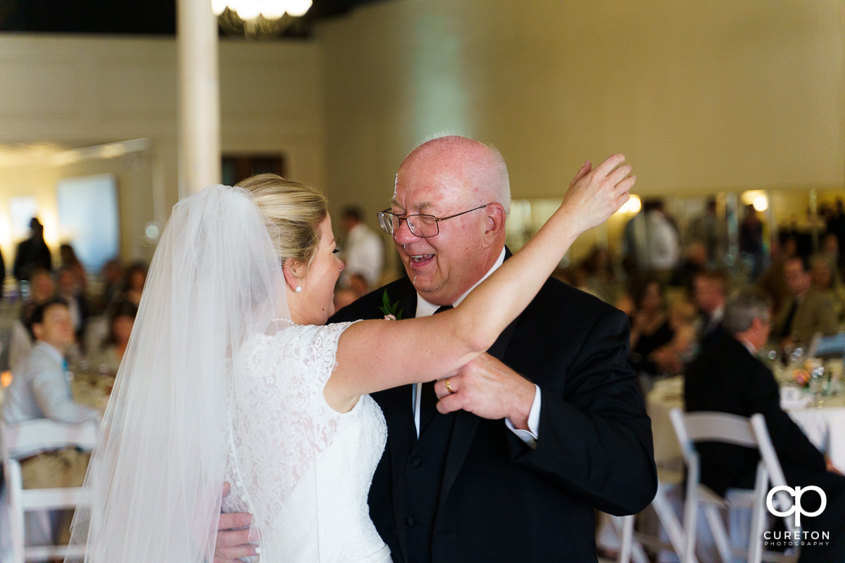 Bride sharing a dance with her father.