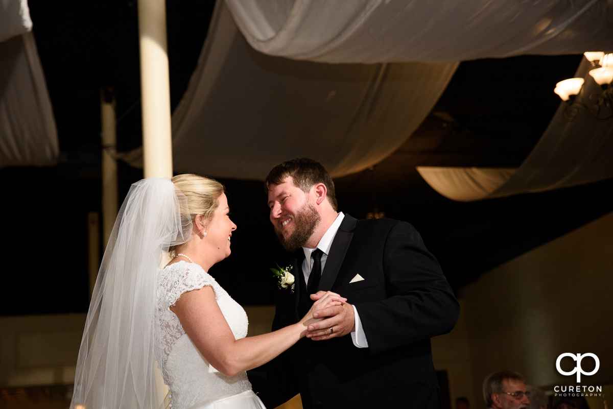 Bride and groom dancing at the wedding reception.