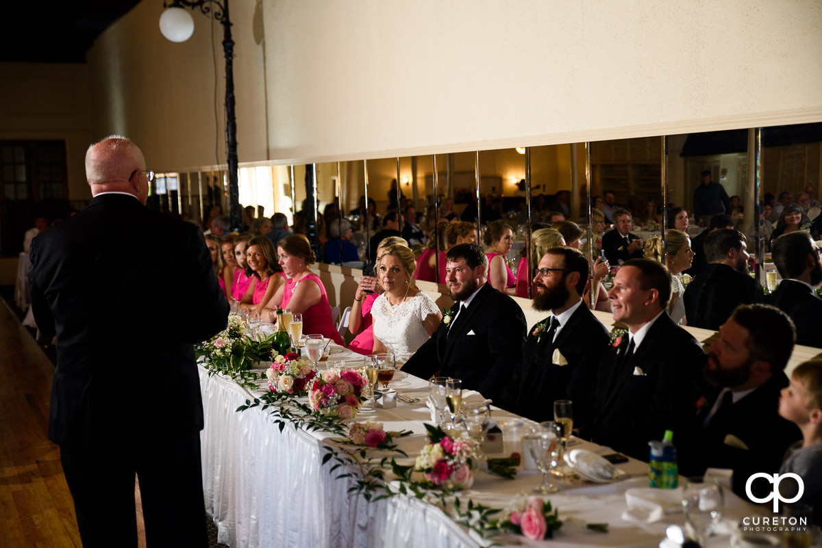 Bride's father giving a speech at their Grace Hall wedding reception in downtown Greer,SC.