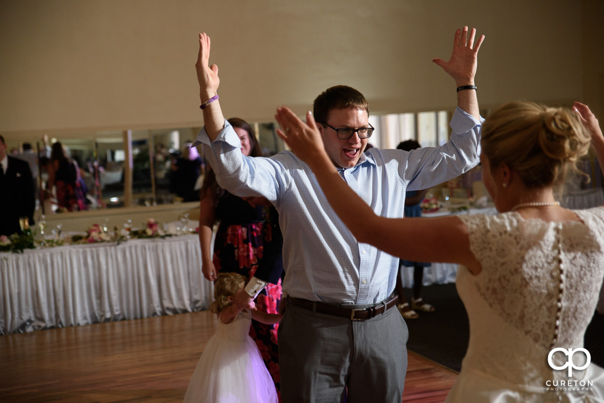 Wedding guests dancing at the Grace Hall reception to the sounds of DJ Sam from PPE Event Group.