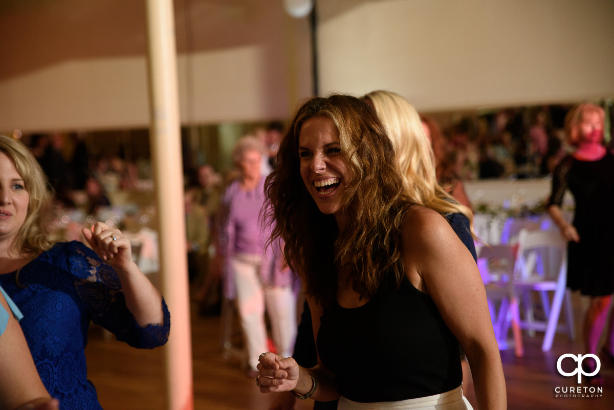 Guests dancing at the Grace Hall wedding reception to the sounds of DJ Sam from PPE Event Group.