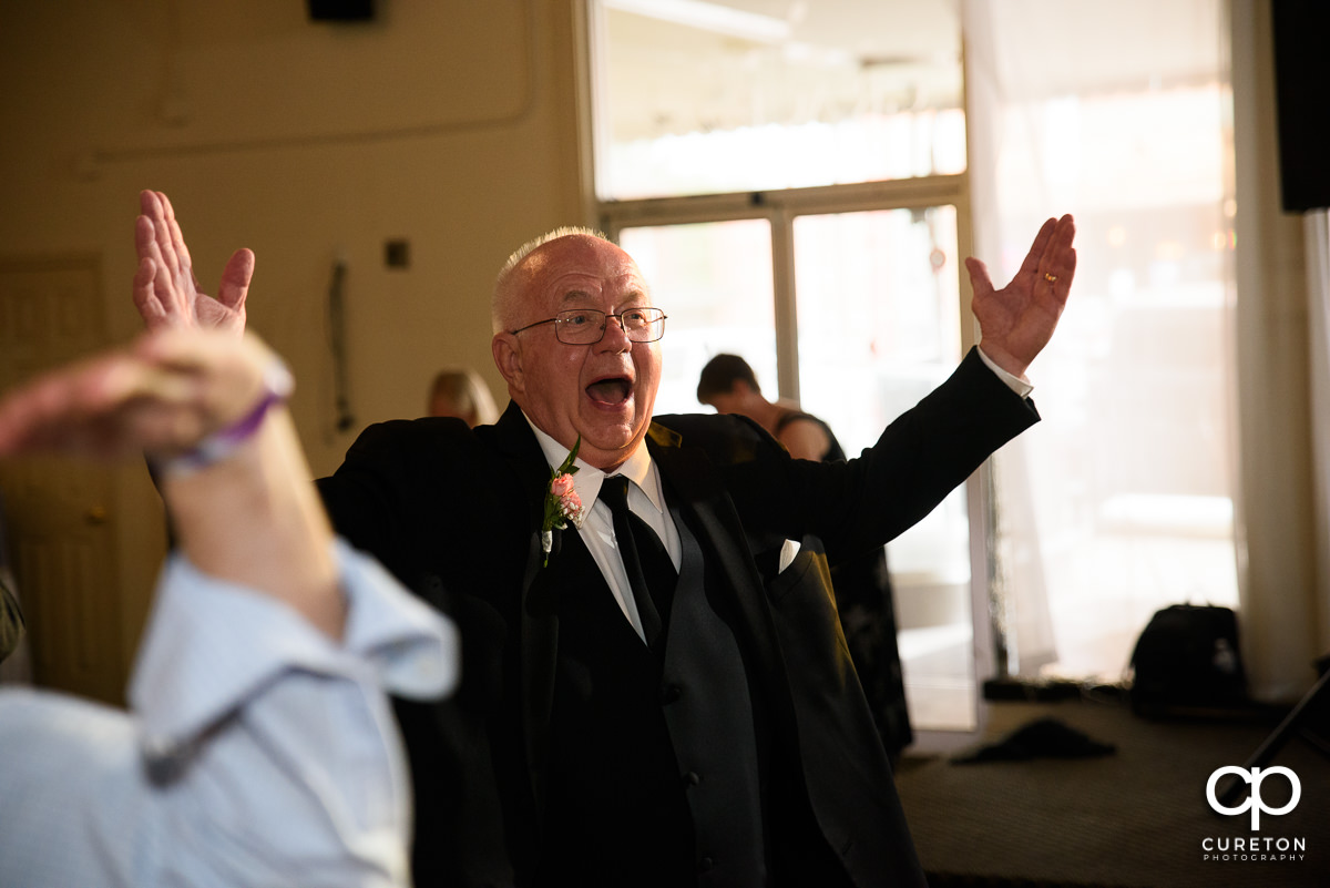 Guests dancing at the Grace Hall wedding reception to the sounds of DJ Sam from PPE Event Group.