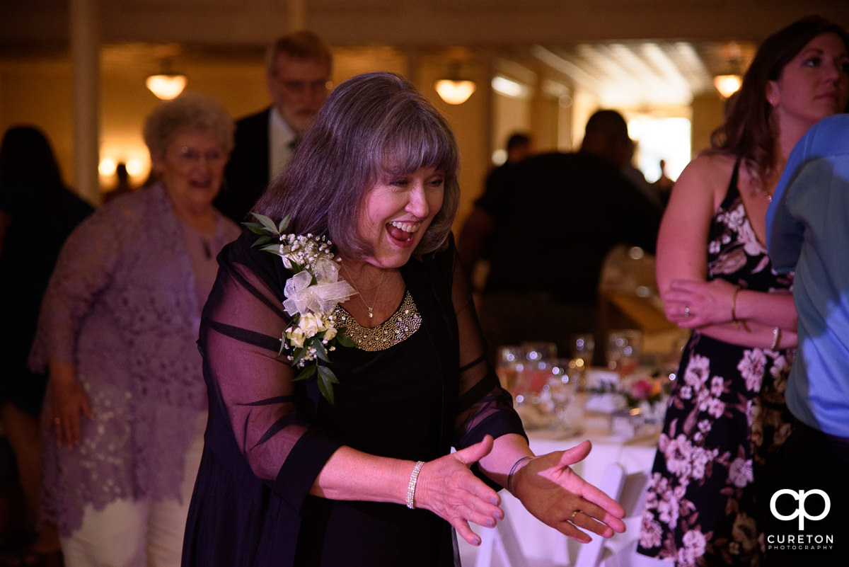 Guests dancing at the Grace Hall wedding reception to the sounds of DJ Sam from PPE Event Group.