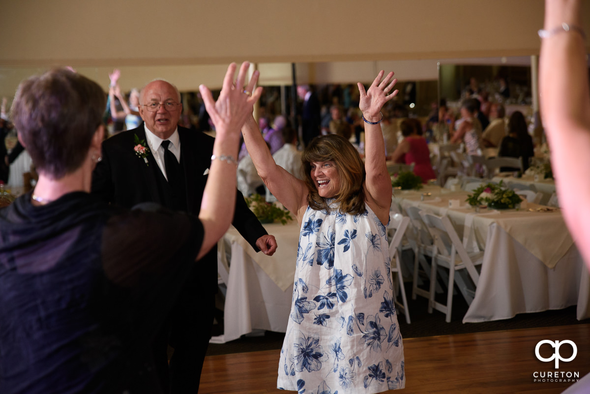 Guests dancing at the Grace Hall wedding reception to the sounds of DJ Sam from PPE Event Group.